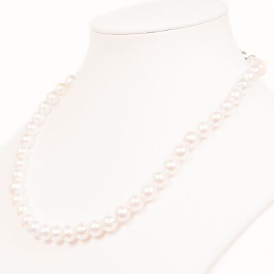 Lovely Single Strand Of Japanese Semi Baroque Akoya Pearls On White Silk.