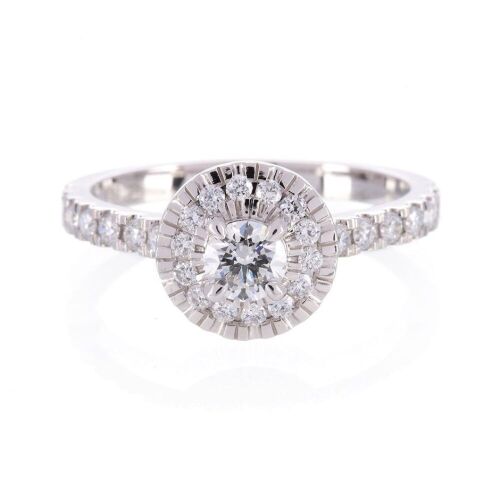 One ladies platinum Halo style round brilliant cut diamond ring TDW=0.72ct