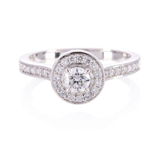 One ladies platinum Halo style round brilliant cut diamond ring TDW=0.60ct