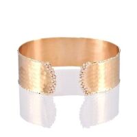 One ladies wide cuff style bangle 14yg with 54 round diamonds TDW=0.62ct