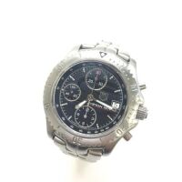 DNL Retail Replacement Value $9,325.00 - One New Authentic LINK series Chronograph 1/10th Gents Tag Heuer AYRTON SENNA “Limited Edition" wrist watch with a Black dial.
