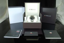 DNL Retail Replacement Value $8,325.00 - One New Authentic Gents Tag Heuer 6000 Series Mika Hakkinen Signed Signature 1/10th chronograph "Limited Edition" wrist watch with a black dial. - 12