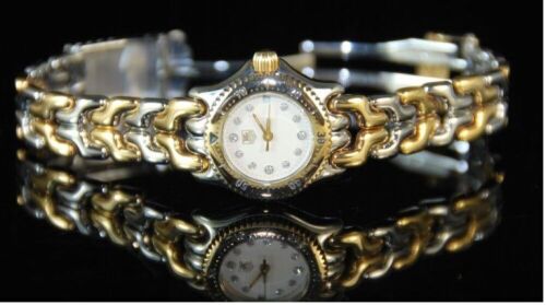 DNL Retail Replacement Value $24,000.00 - One New Authentic Ladies Tag Heuer S/EL series “Limited Edition" wrist watch with a white dial with set diamonds.11 single cut claw