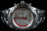 DNL Retail Replacement Value $7,225.00 - One Authentic Gents Limited Edition Tag Heuer ORACLE RACING 1/10th Chronograph Link "Limited Edition" wrist watch with a silver dial.