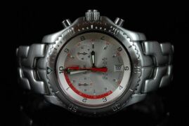 DNL Retail Replacement Value $7,225.00 - One Authentic Gents Limited Edition Tag Heuer ORACLE RACING 1/10th Chronograph Link "Limited Edition" wrist watch with a silver dial. - 2
