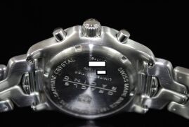 DNL Retail Replacement Value $7,225.00 - One Authentic Gents Limited Edition Tag Heuer ORACLE RACING 1/10th Chronograph Link "Limited Edition" wrist watch with a silver dial. - 9