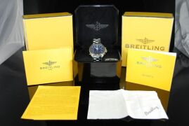 DNL Retail Replacement Value $8,540.00 - One Authentic Gents Breitling "Limited Edition – Pluton Professional Quartz A51038" Watch with a blue digital dial. - 10