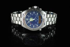 DNL Retail Replacement Value $8,540.00 - One Authentic Gents Breitling "Limited Edition – Pluton Professional Quartz A51038" Watch with a blue digital dial. - 2