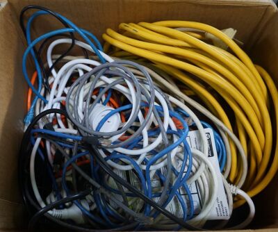 Box of assorted power extension and LAN leads