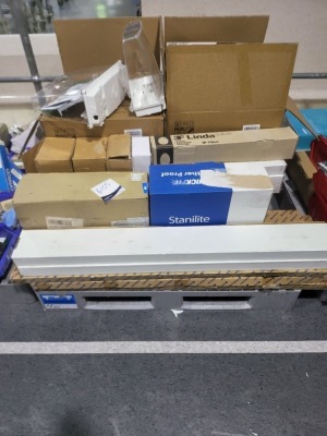 Pallet of fluorescent tubes, exit sign defuser, Fluro light housings