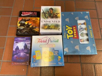 Bundle of Toy Story Chess Set, Undaunted Reinforcements, Trivial Pursuit, Traveller The Glorious Empire, Rivals Card Game