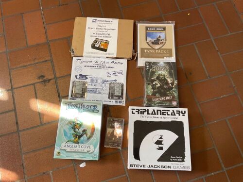 Bundle of Triplanetary, Game of Thrones the card game, Tidal Blades, Thunderstone Quest, Tigers in the Snow, Tank Pack 1 book and Board Game Organiser
