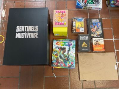 Bundle of Sentinels of the Multiverse, Obama Llama 2, Overlight book, Marvel Miniature Game, Old-School Essentials book, Savage Choices, Western Legends Expansion and Folder Space game Inserts.