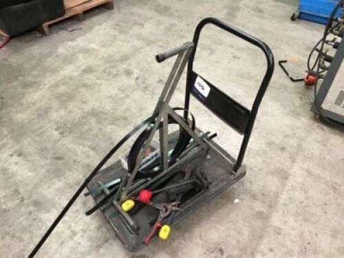 Manual strapping machine coil holder and trolley