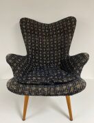 One original Grant Featherston R160 Contour Armchair, original upholstery.