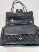 One used Chanel labelled leather handbag - 2