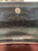 One used Chanel labelled leather handbag - 4