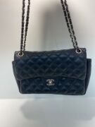 One used Chanel labelled leather handbag - 7