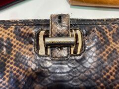 One used red handbag, One used Jimmy Choo labelled snake design womens wallet and one used brown Jimmy Choo light brown womens wallet - 2