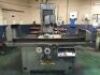 Schiff surface grinder