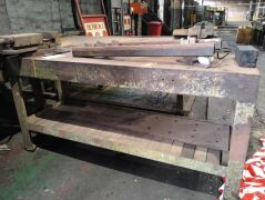 Approximately 2m X 0.5m x 1m iron workbench with vice