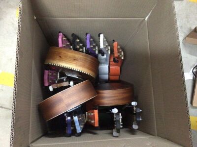 Box bundle of 15 water damaged Ukelele's