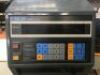 FUJI MOTORISED PNEUMATIC FORM, FILL, WRAP AND SEAL MACHINE Model: EW3400-R, S/N: 084009 with Pass Through Conveyor, Take-Out Conveyor, Overhead Wrap Feed-Out System, Touch Pad Control to 415V 3 Phase Electric Motor and Switch Mounted on Mobile Base - 5