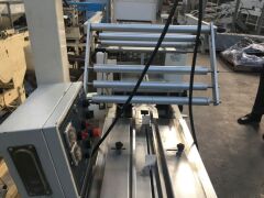 PFM MOTORISED FLOW WRAPPING MACHINE Model: PFM-30 with Approx 200mm Rubber Belt Infeed Conveyor, Take-Out Conveyor, Overhead Wrap Feed-Out Station, Control to 415V 3 Phase Electric Motor and Switch on Mobile Base - 4