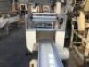 PFM MOTORISED FLOW WRAPPING MACHINE Model: PFM-30 with Approx 200mm Rubber Belt Infeed Conveyor, Take-Out Conveyor, Overhead Wrap Feed-Out Station, Control to 415V 3 Phase Electric Motor and Switch on Mobile Base - 6