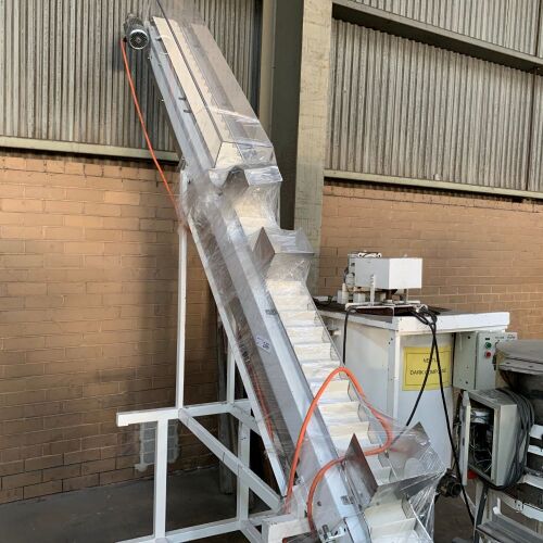 Motorised Steel Framed Cleated Belt Elevating Conveyor Powered by 415V 3 Phase Electric Motor and Switch Mounted on Steel Framed Mobile Base