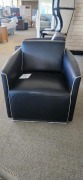 Vivid leather armchair black leather with white trim and silver base - RRP $999 - Ex-Display