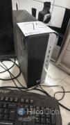 Contents of the office including a desk, chair, HP ProDesk Small Form Factor Desktop Computer