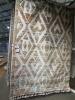 Geometric Pattern Tufted Area Rug, multicolor raised pile design, white base, fringe tassels on ends