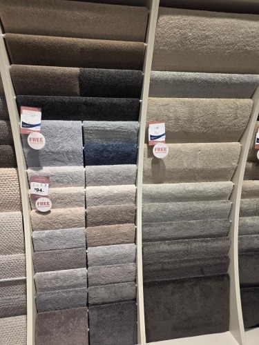 2x Wall of ex display Nylon rugs. Various sizes - Dimensions unknown