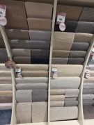 2x Wall of ex display pure wool rugs. Various sizes - Dimensions unknown