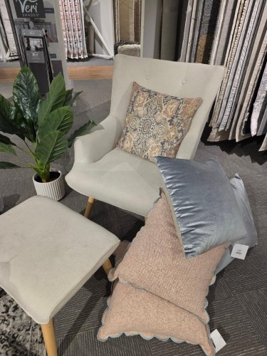 Display chair, footstool, fake plant and 6x cushions. sold as lot