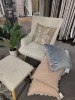 Display chair, footstool, fake plant and 6x cushions. sold as lot