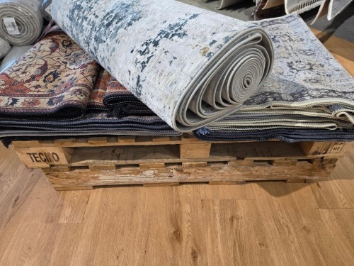 2x pallets inc. rugs with unknown sizes and specs. must take pallets