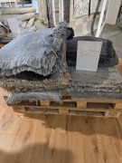 2 pallets with rugs unknown specs and sizes. must take pallets