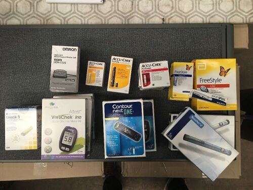 Approximately 22 items of assorted glucose testing items