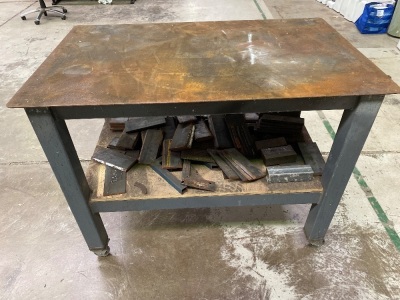 Steel Heavy Fabrication Table on wheels with plate off cuts.