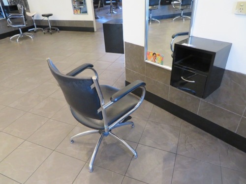 Swivel Hairdressing Chair, Chrome frame upholstered in Black Vinyl with small wall mounted Equipment Console