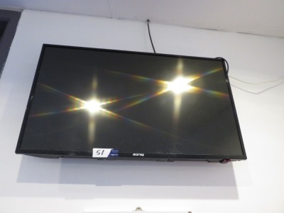 Soniq LCD Television with remote control (approx 110cm), wall mounted